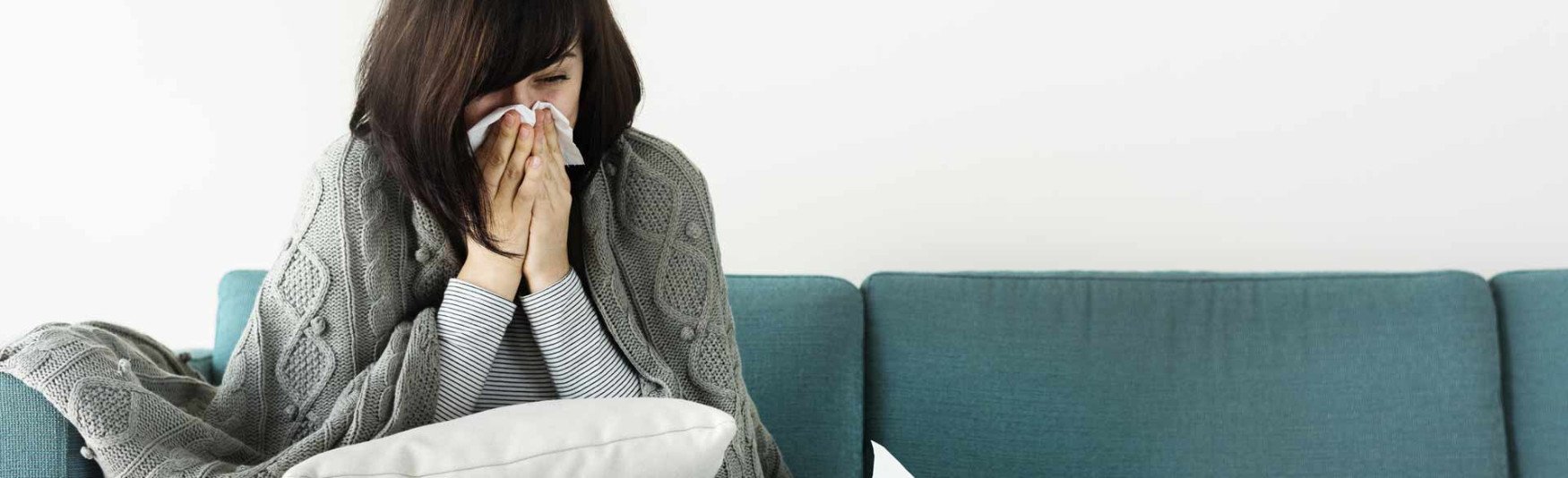 sick woman suffering with flu